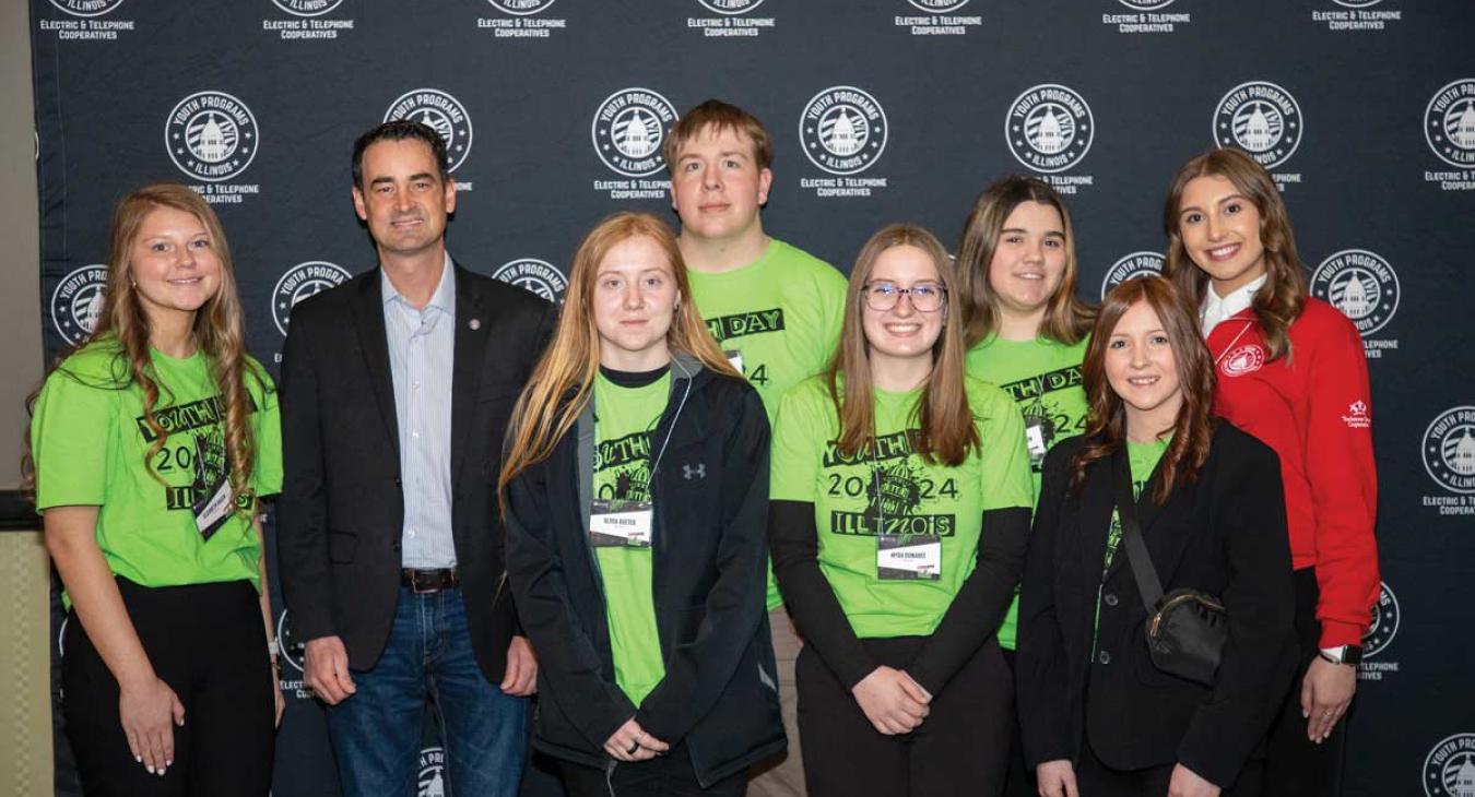 Students in green Youth Day 2024 shirts